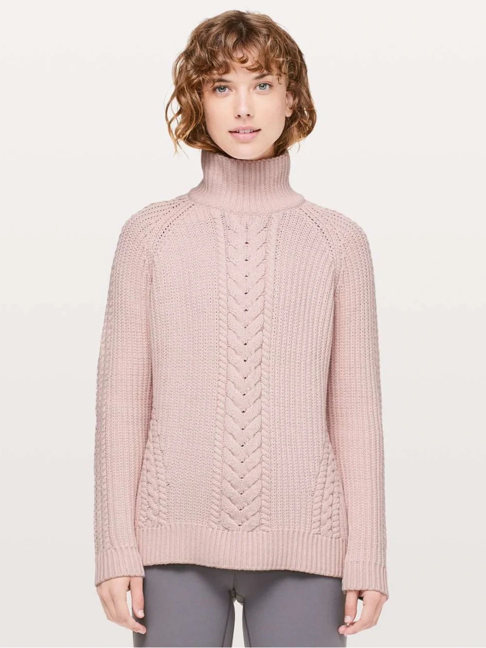 Lululemon Bring The Cozy Turtleneck in a soft misty pink cable knit